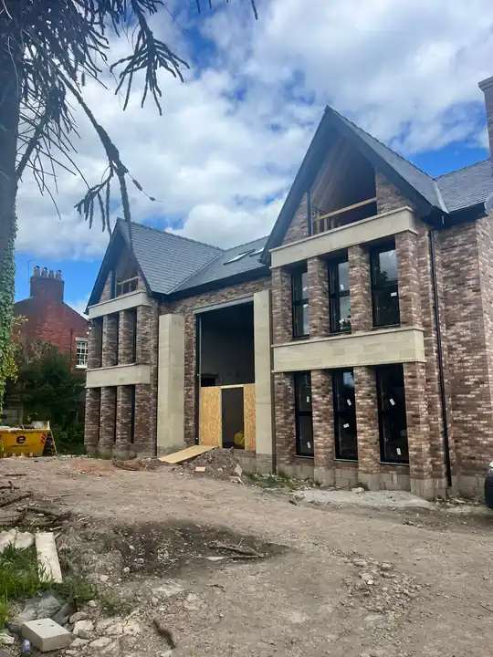 Brick and stone luxury new-build home where AKS is installing concealed air conditioning